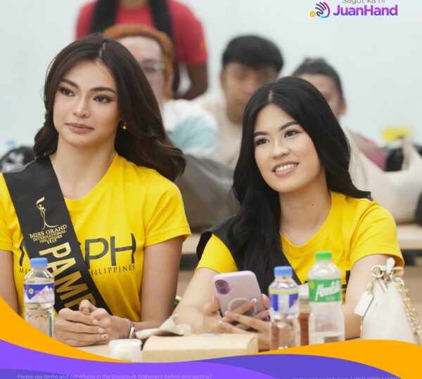Ms. Pampanga and Ms. Poblacion listening to Mr. Francisco "Coco" Mauricio talking about JuanHand and Financial Literacy.